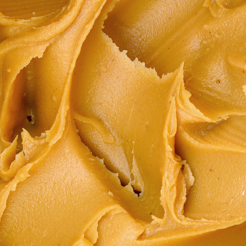 Textura suave y cremosa de la crema de maní WAKEUP natural 72g en primer plano