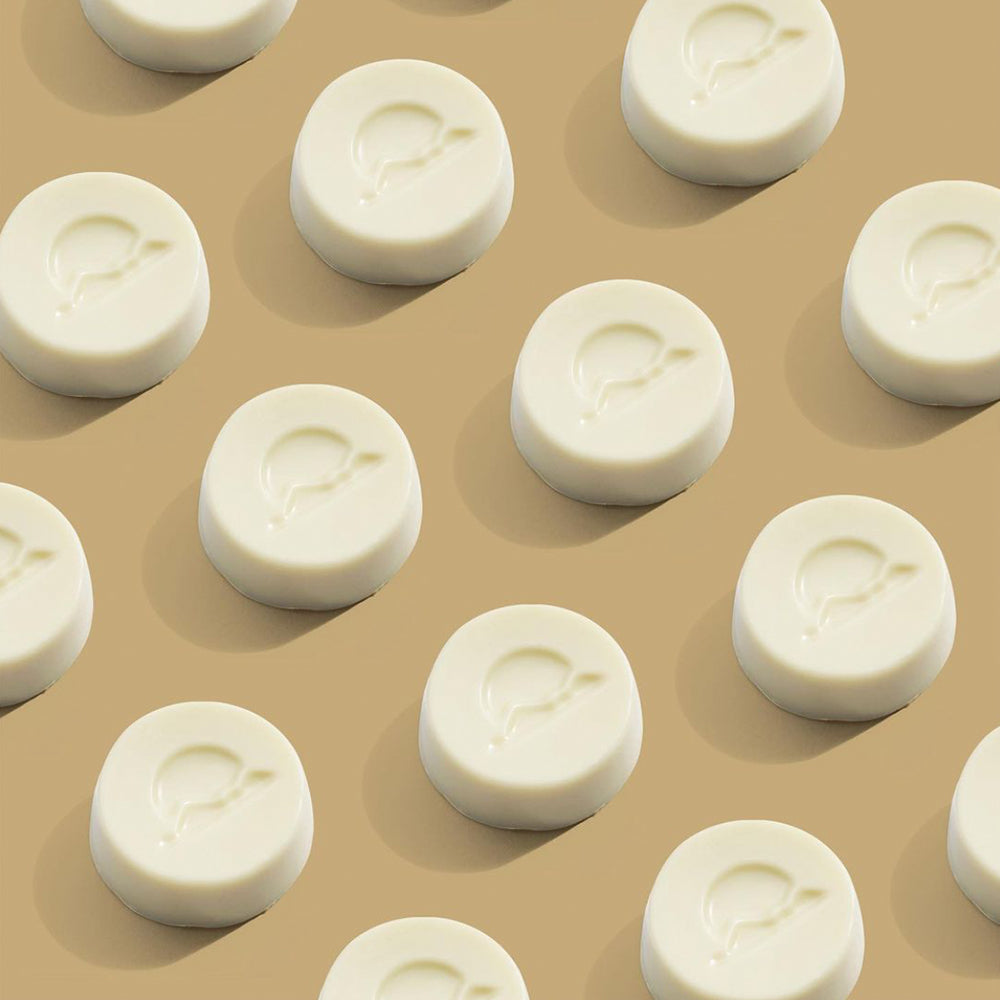 Vista superior de Choco Snow Up WAKEUP en forma de pastillas blancas